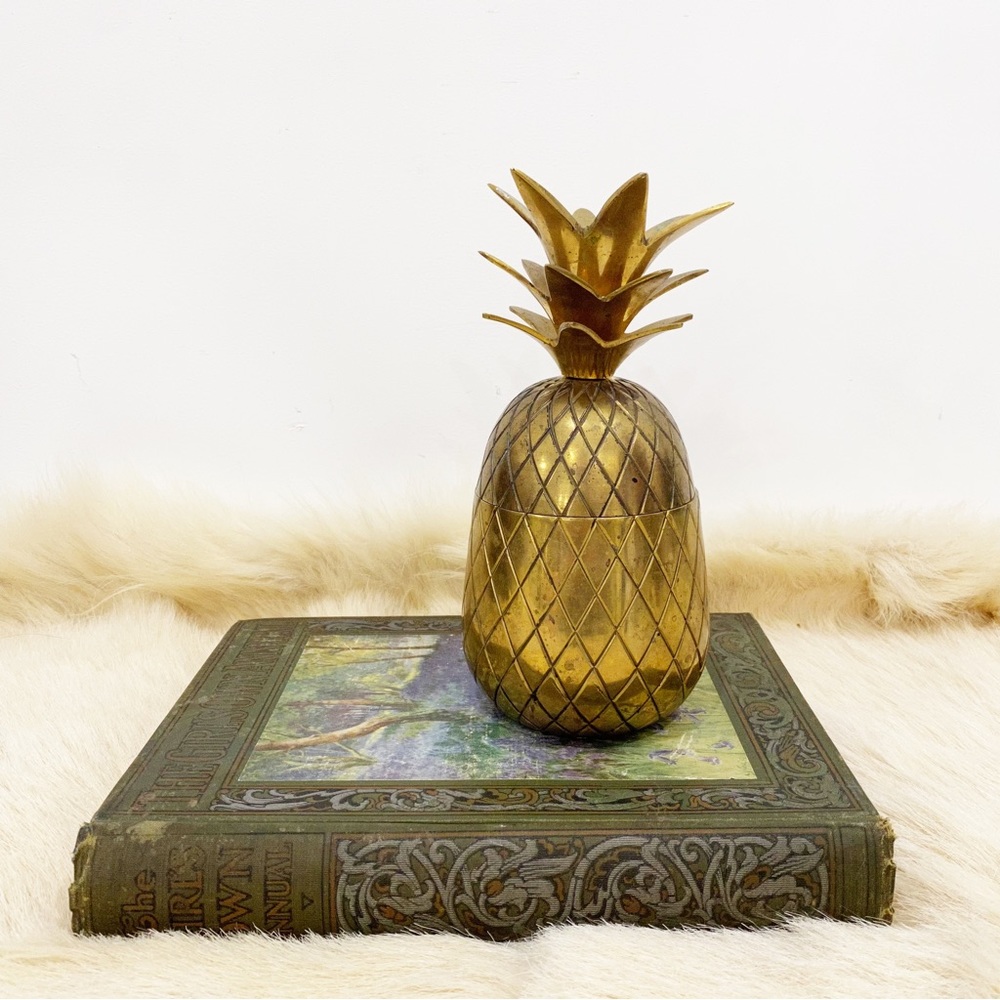 Brass pineapple catch all candlestick. 9’’ tall.